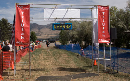 Curtis J. Morley approaching the finish line of the Ogden Valley Triathlon