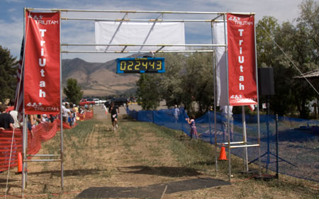 Curtis J. Morley approaching the finish line of the Ogden Valley Triathlon